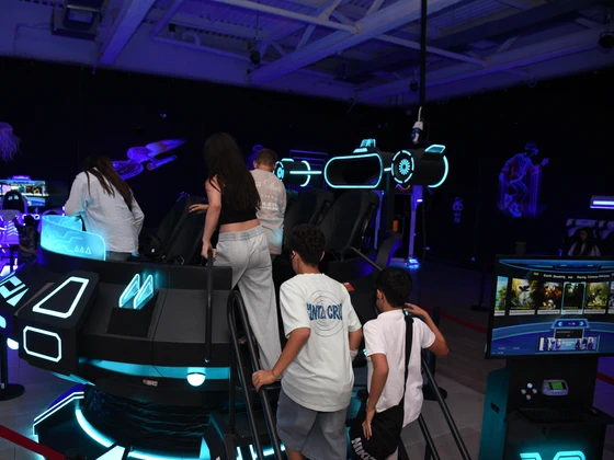 A group of teens going up to the UFO ring together